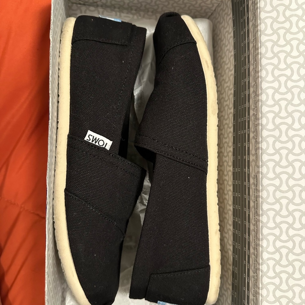 TOMS Black Slip-Ons